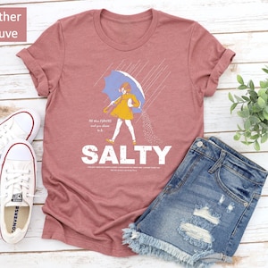 Keep it casual and chic in our Salty Girl Vintage Tee. ☀️ Designed for women who love the beach life and good energy. This short sleeve cotton blend top brings effortless style to every summer adventure — the perfect trendy gift!