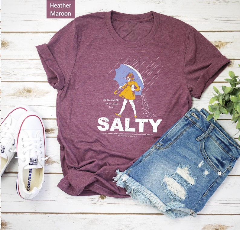 Make waves with the Salty Girl Tee! 🌊 This women’s vintage cotton blend shirt adds a sassy touch to your summer look. Comfortable, lightweight, and effortlessly trendy — great for travel, casual days, or as a fun beach gift for your girls!