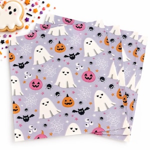 May include: A stack of square paper napkins featuring a light purple background with a repeating Halloween pattern of white ghosts, orange and pink jack-o'-lanterns, black bats, small black spiders, white spiderwebs, and tiny orange stars.