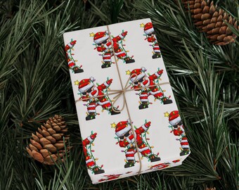 Papier cadeau drôle de père Noël en tamponnant, Emballage cadeau de Noël, Adorable emballage des fêtes, Imprimé père Noël festif, Fournitures pour cadeaux de Noël