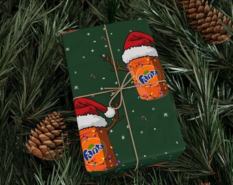 Papier cadeau de Noël Fanta Soda, bonnet de Noel, bois de renne, flocons de neige, cannes de bonbon, emballage cadeau vacances drôles, emballage de Noël soda à l'orange