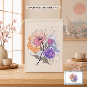 May include: A beige drawstring bag with a floral embroidery design. The embroidery features a large pink flower, a purple flower, and an orange accent. The text "MACHINE EMBROIDERY FILE" is at the top.