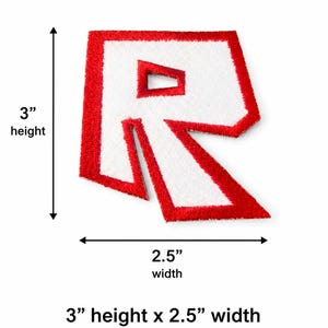 May include: Embroidered patch featuring a white letter "R" with a red border. The patch measures 3 inches in height and 2.5 inches in width. The design is a bold, stylized letter.