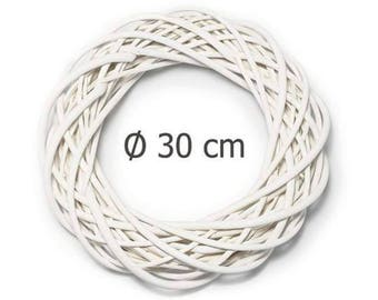 May include: White wicker wreath with a diameter of 30 inches.