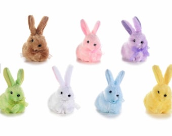 May include: Set of ten plush Easter bunnies in various pastel colors, each with a matching ribbon bow. The bunnies are arranged in a row on a white background.
