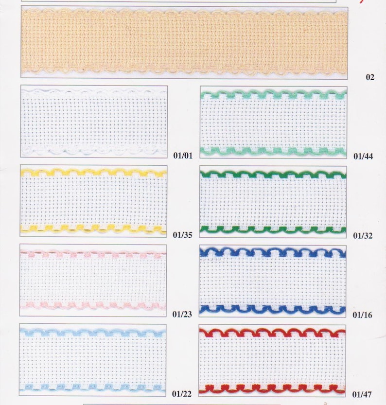 May include: A collection of white fabric ribbon trims with different colored edges. The trims have a scalloped edge and are shown in the following colors: white, green, yellow, pink, blue, and red.