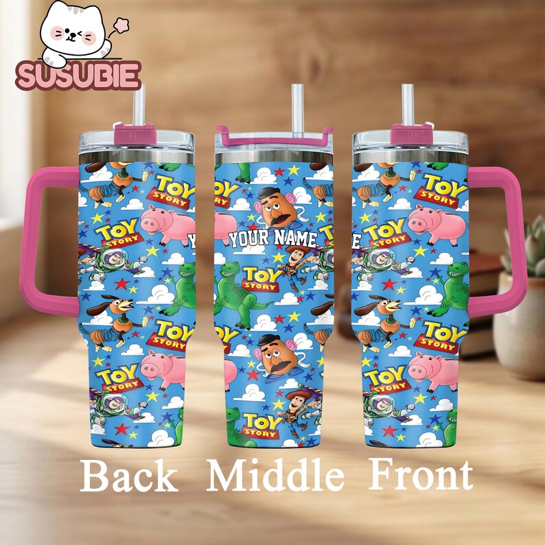 three toy story-themed tumblers with pink handles, each adorned with the characters from the Toy Story franchise. The tumblers are arranged in a row, showcasing the characters and the vibrant, colorful design of the toy story theme.