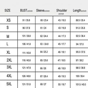 May include: A size chart for clothing, displaying measurements in both centimeters and inches. The chart includes sizes from XS to 5XL, with bust, sleeve, shoulder, and length measurements. The measurements are clearly labeled for each size.