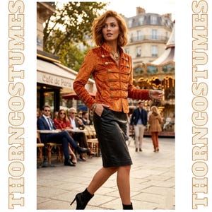 May include: An orange velvet jacket with gold buttons and a high collar is worn with a black leather skirt and black ankle boots. The jacket has a military style. The background shows a Parisian street scene with a cafe and carousel.