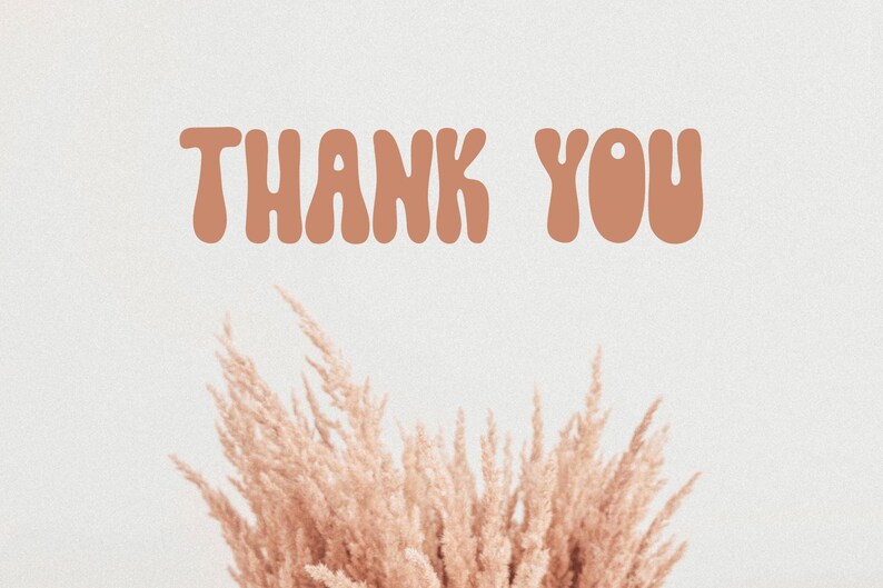 May include: A light beige background with the words "THANK YOU" in a rounded, orange-brown font. Below the text is a cluster of dried, light brown ornamental grass.