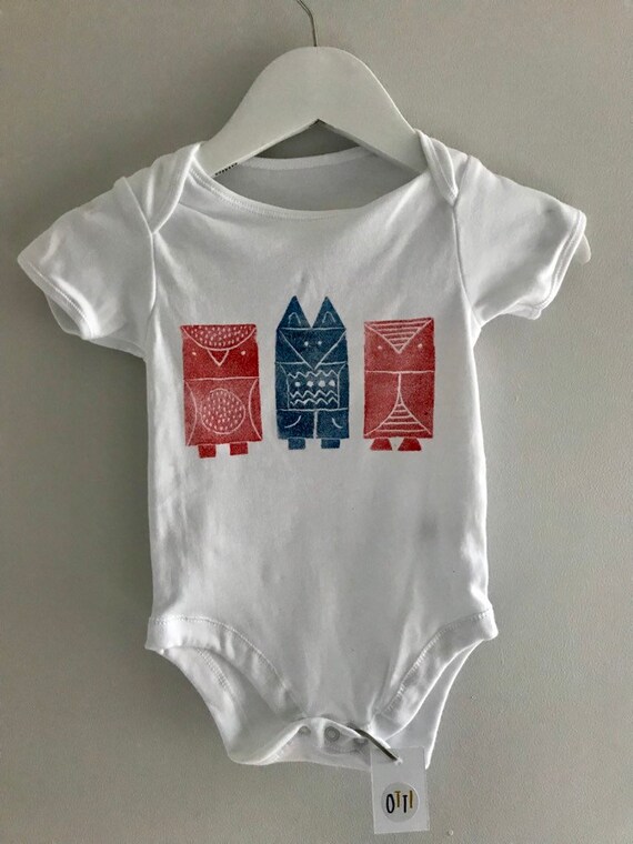 animal print baby grow