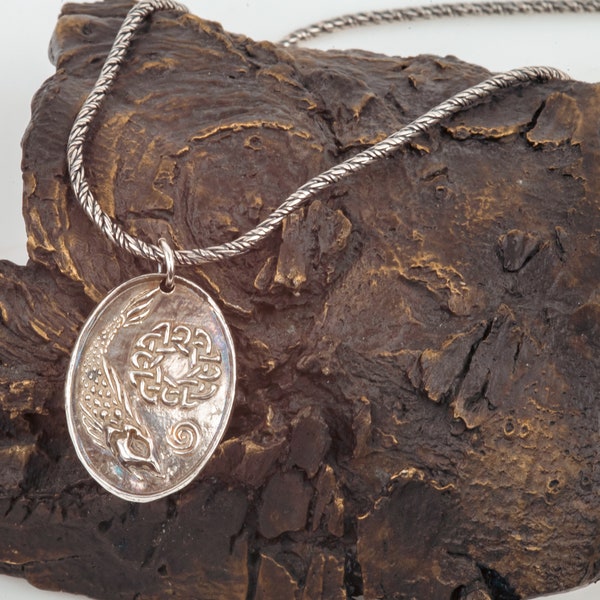 Sterling Silver Celtic Salmon of Knowledge on an 18 inch sterling silver chain