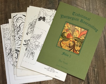 May include: A green book titled "Traditional Norwegian Rosemaling, Folio 2 by Pat Vleck, Nordic Publishers" with a colorful floral design on the cover. The book is accompanied by a stack of black and white line drawings.