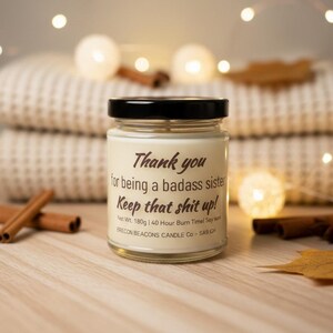 May include: A set of three ceramic mugs with a speckled, matte finish. The mugs are in shades of cream, light gray, and dark gray. Each mug has a simple, minimalist design and a rounded handle.