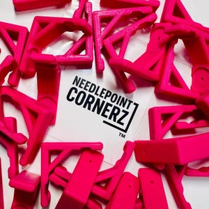 May include: A white ceramic mug with a black handle and the text "But First, Coffee" in a black, bold font. The mug is sitting on a wooden surface. The mug is approximately 4 inches tall.