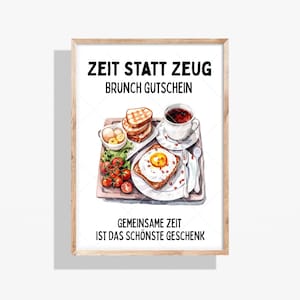 Könnte beinhalten: Ein gerahmter Druck mit einer Aquarellillustration eines Brunch-Gerichts. Das Bild zeigt Toast, Eier, Tomaten und Kaffee. Der Text oben lautet "ZEIT STATT ZEU", und unten "GEMEINSAME ZEIT IST DAS SCHÖNSTE GESCHENK".