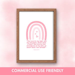May include: A framed print featuring a pink rainbow design with hearts. The text reads, "The Lord is my light and my salvation; whom shall I fear? The Lord is the stronghold of my life; of whom shall I be afraid?" Psalm 27:1.