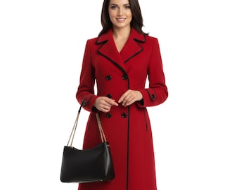 May include: A red double-breasted coat with black trim and buttons. The coat is paired with a black handbag with a gold chain strap. The woman is wearing a black dress and black heels. The coat is a classic style.