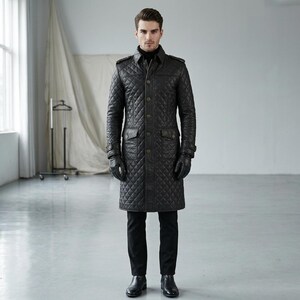 May include: A black quilted leather trench coat featuring a button-down front, a pointed collar, shoulder epaulets, and two front flap pockets. The coat is paired with black trousers, black leather gloves, and black leather dress shoes.