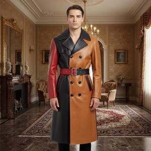 May include: A color-blocked leather trench coat in black, red, and tan. The coat features a double-breasted design, a black collar, and a red and black belt. The coat is worn by a person in a room with a fireplace and chandelier.