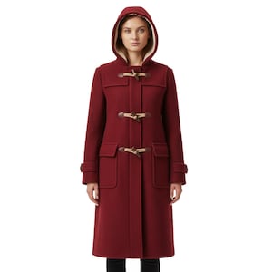 May include: A burgundy duffel coat with a hood and toggle fastenings. The coat features two front pockets and a light-colored lining in the hood. A classic style, suitable for cold weather, it is a timeless outerwear piece.