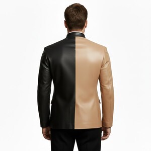 May include: A two-tone leather jacket, split vertically with a black left side and a tan right side. The jacket has a mandarin collar and a tailored fit, suitable for formal or semi-formal occasions.