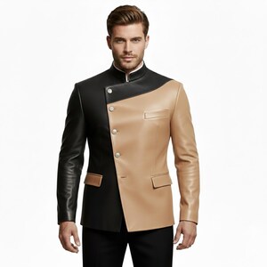 May include: A two-tone leather jacket in black and tan. The jacket features a mandarin collar, a diagonal design, and silver buttons. It has two front pockets and a tailored fit, suitable for formal or semi-formal occasions.