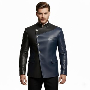 May include: A two-tone leather jacket in black and navy blue. The jacket features a mandarin collar, silver buttons, and a unique asymmetrical design. The jacket has two pockets and long sleeves.