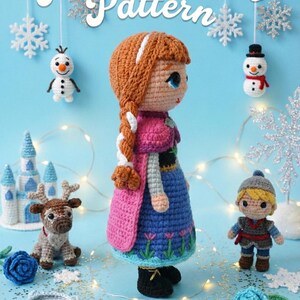 May include: Crocheted Anna doll from the movie Frozen, with a long braid, pink cape, and blue dress. The image includes other crocheted characters and objects from the movie, such as Olaf, Kristoff, a reindeer, and a castle. The text "Anna Frozen Pattern" is at the top.