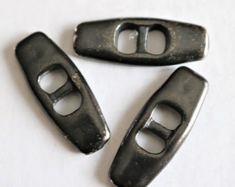 3 metal toggle buttons