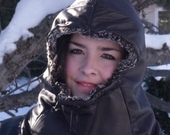 Upcycled leather hood with pompon