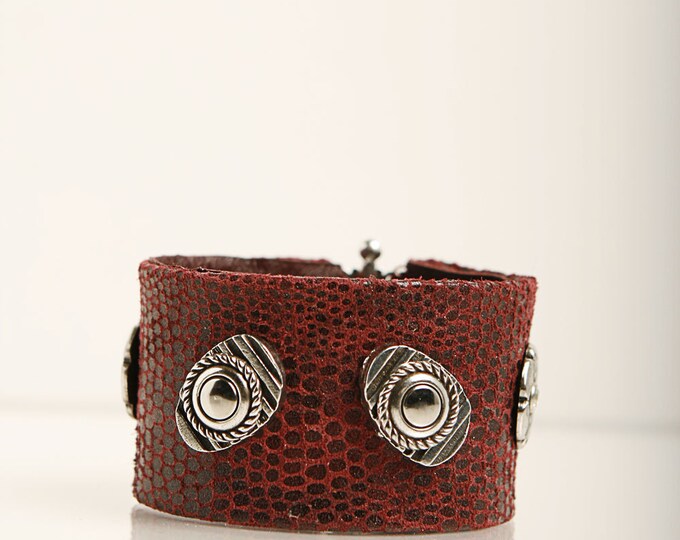 Printed leather  wide wristband.