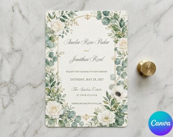 May include: A rectangular wedding invitation card featuring a floral border of white roses, eucalyptus leaves, and greenery. The text reads Amelia Rose Parker and Jonathan Reed, request the pleasure of your company, Saturday, May 29, 2027, The Garden Estate, at four o'clock, dinner and dancing to follow.