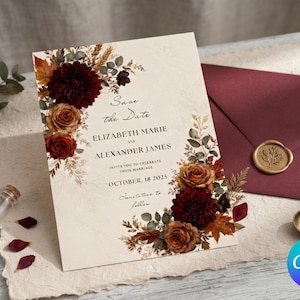 Może przedstawiać: Kremowa karta z zaproszeniem ślubnym z ilustracjami kwiatów w kolorze ciemnej czerwieni i palonej pomarańczy, z tekstem Save the Date, ELIZABETH MARIE AND ALEXANDER JAMES, OCTOBER, 18 2025 oraz Invitation to follow.