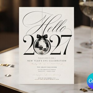 May include: A rectangular New Year's Eve invitation card featuring the text Hello 2027 in black serif font. A silver disco ball with a black bow replaces the zero in 2027. The card includes details for a celebration at The Grand Ballroom.