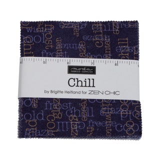 May include: A pack of fabric squares with a blue background and gold and purple text. The text includes words like "chill", "frost", "freeze", and "winter". The pack is labeled "Chill" by Brigitte Heitland for ZEN CHIC.