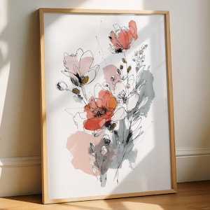 May include: A framed art print displaying a floral illustration in watercolour and ink. The artwork features flowers in coral, pink, and grey hues, set against a white backdrop, and is framed in a light wood frame.