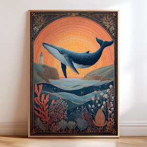 May include: A framed art print featuring a stylized illustration of a whale leaping above the ocean. The artwork has a warm color palette with a sunset background, a lighthouse, and decorative floral elements. The whale is a deep blue color.