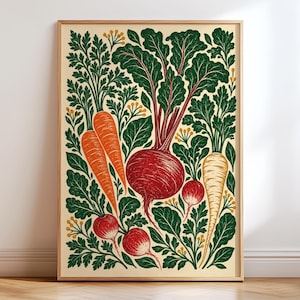 May include: A framed art print featuring a botanical illustration of various root vegetables including orange carrots, a large red beet, smaller red radishes, and a pale parsnip, all surrounded by dense, dark green leafy foliage on a cream background.