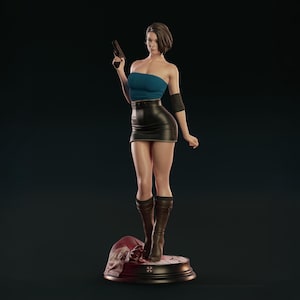 May include: A detailed figurine of a woman in a blue tube top, black skirt, and brown boots, holding a gun. The figure stands on a circular base with a skull and blood-like details. The overall aesthetic is dark and detailed.