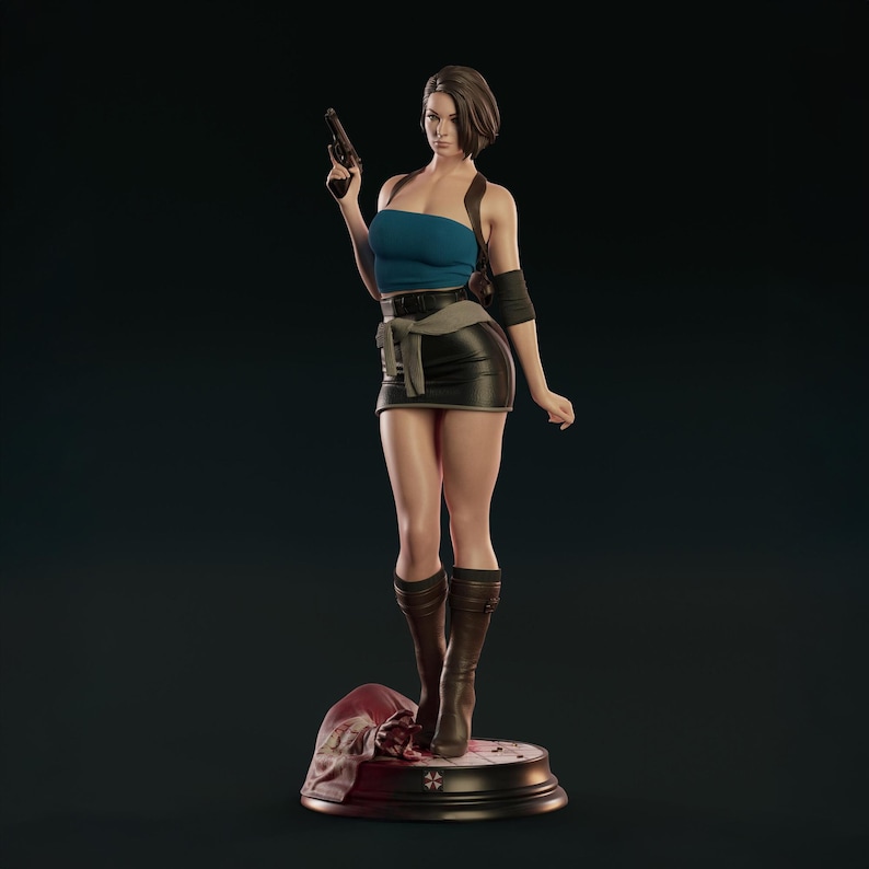 May include: A detailed figurine of a woman in a blue tube top, black skirt, and brown boots, holding a gun. The figure stands on a base with a red cloth and a symbol. The overall aesthetic suggests a video game or action theme.