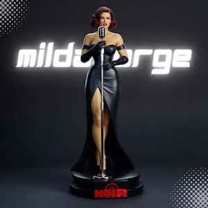 May include: A figurine of a singer with dark red hair, wearing a strapless black gown with a high slit and black opera gloves. The figure stands at a silver microphone stand on a circular base with the red text NOIR. The word mildaorge is behind.
