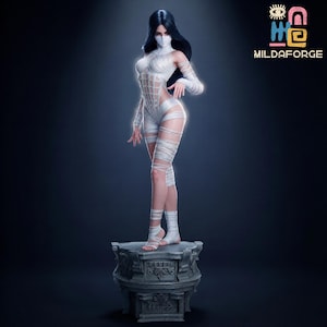 May include: A white ceramic mug with a black handle and the text "But First, Coffee" in a bold, black font. The mug is set against a blurred background, suggesting a cozy setting. The mug appears to be approximately 4 inches tall.