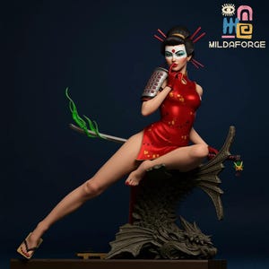 May include: A figurine of a woman in a red dress with gold floral patterns, holding a metallic object and a sword. The figurine has a geisha-style hairstyle and makeup. The figurine is seated on a dragon-like base. The text "MILDAFORGE" is visible.