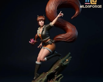 May include: A detailed figurine of a woman with a large, flowing, reddish-brown tail, wearing a black jacket, orange top, and shorts. She is holding a pink flower and is posed on a mossy log. The figurine is a collectible item.