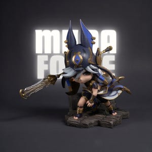 May include: A detailed figurine of a character in a dynamic pose, holding a large sword. The figure is dressed in a dark blue and gold outfit with a stylized helmet. The background features the text "MUGA FORCE".