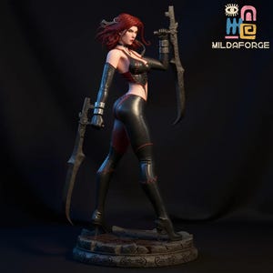 May include: A detailed figurine of a female warrior with red hair, clad in black and red attire, holding two large swords. The figure stands on a stone base. The logo "MILDAFORGE" is visible in the upper right corner.