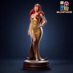 May include: A gold statue of a woman with long red hair, wearing a gold dress with a high slit. The statue is on a round, tiered base. The text "MILDAFORGE" is in the upper right corner.