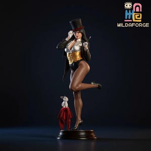 May include: A statue of a woman in a magician's outfit, including a black top hat, jacket, and bodysuit. She holds a wand and stands with one leg raised, next to a rabbit on a red cloth. The statue is on a round, dark base.