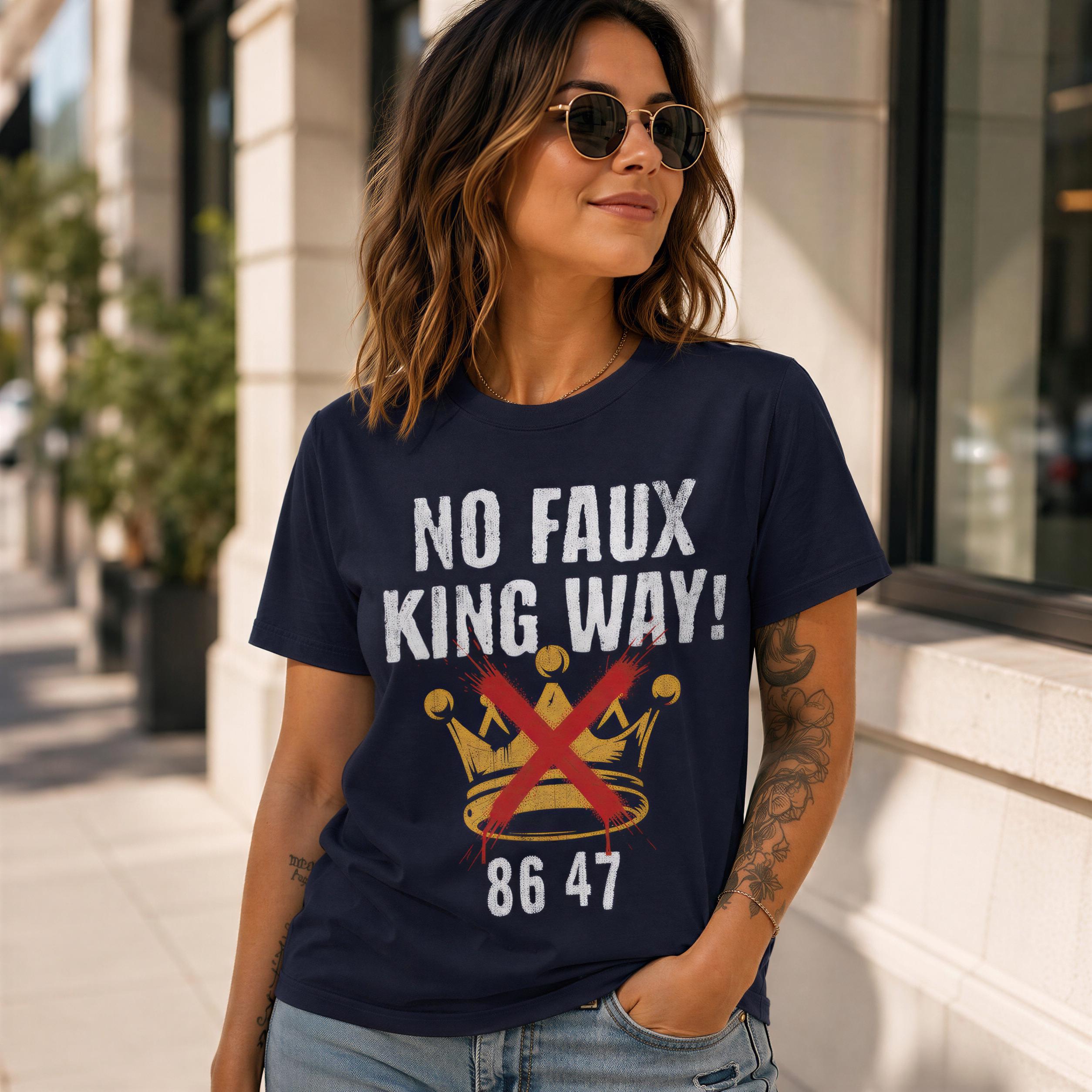 A woman wearing a navy blue t-shirt with a graphic design and text, standing in front of a building.